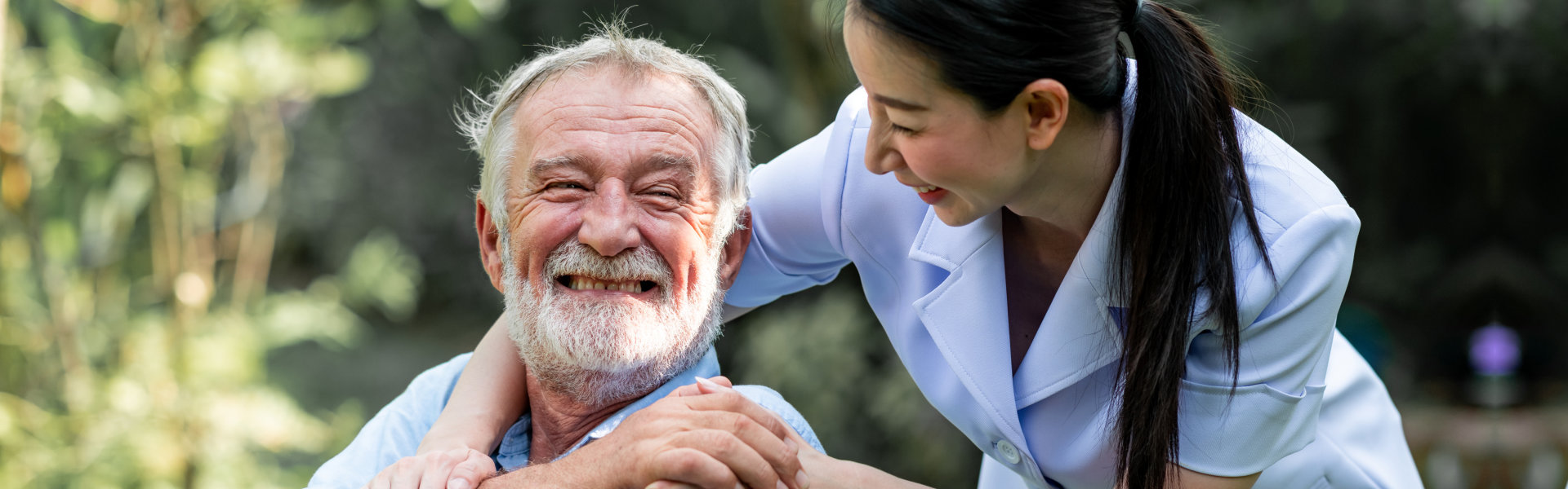 nurse and senior smiling